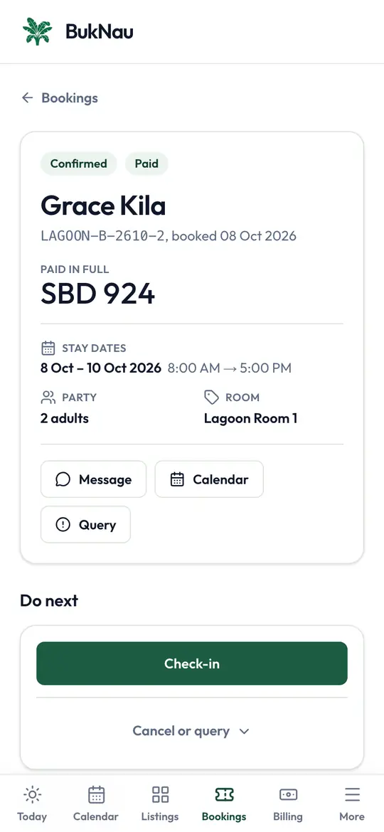 A confirmed, paid booking on the operator’s phone, with the guest’s name, dates, room and a Check-in button.